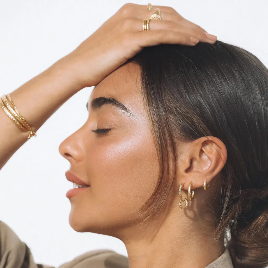 luka_gold_huggie_earrings_1.webp Banabae Luka Gold Huggie Earrings-Women Jewellery