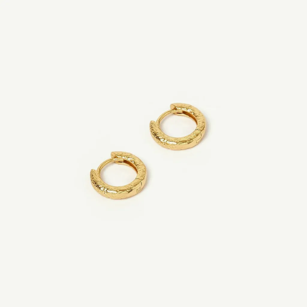 luka_gold_huggie_earrings_2.webp Banabae Luka Gold Huggie Earrings-Women Jewellery